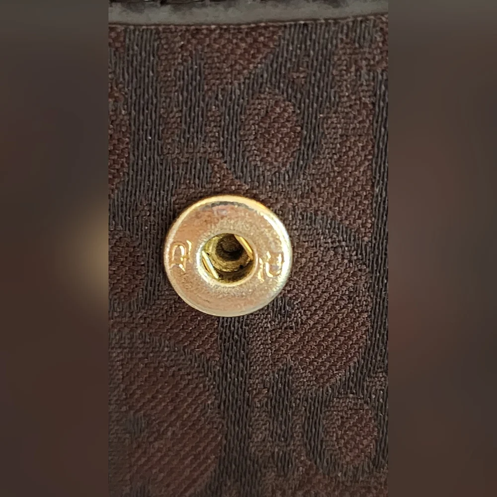 Christian Dior Trotter coin pouch.